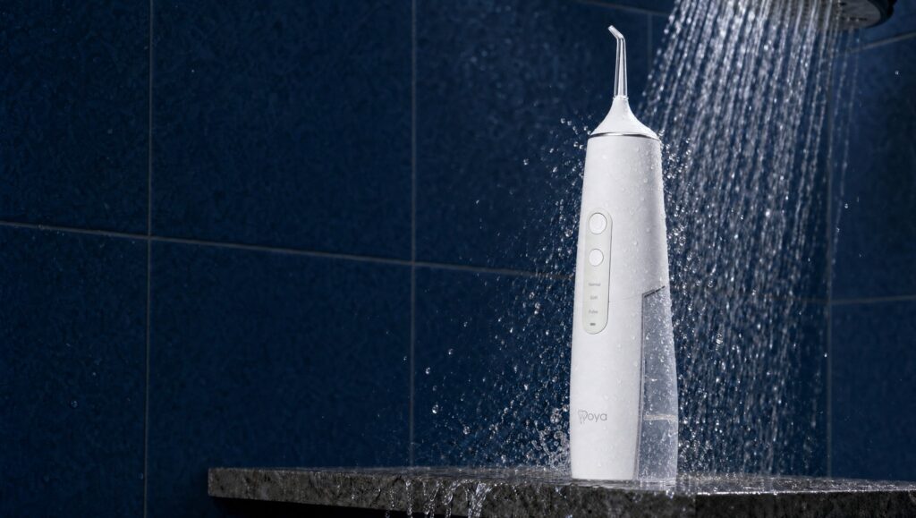 Irigator bucal Woya WH100 300 ml alb, rezistent la apă, sub duș